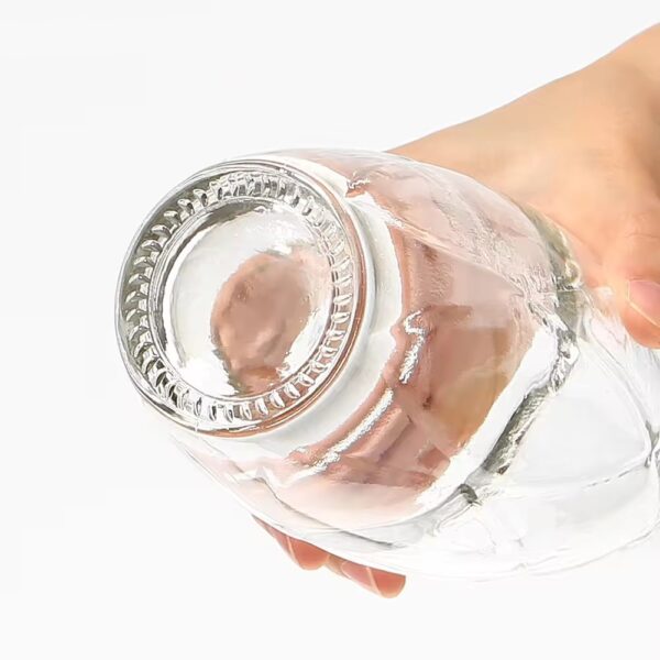 water drop bottle with lines engraved